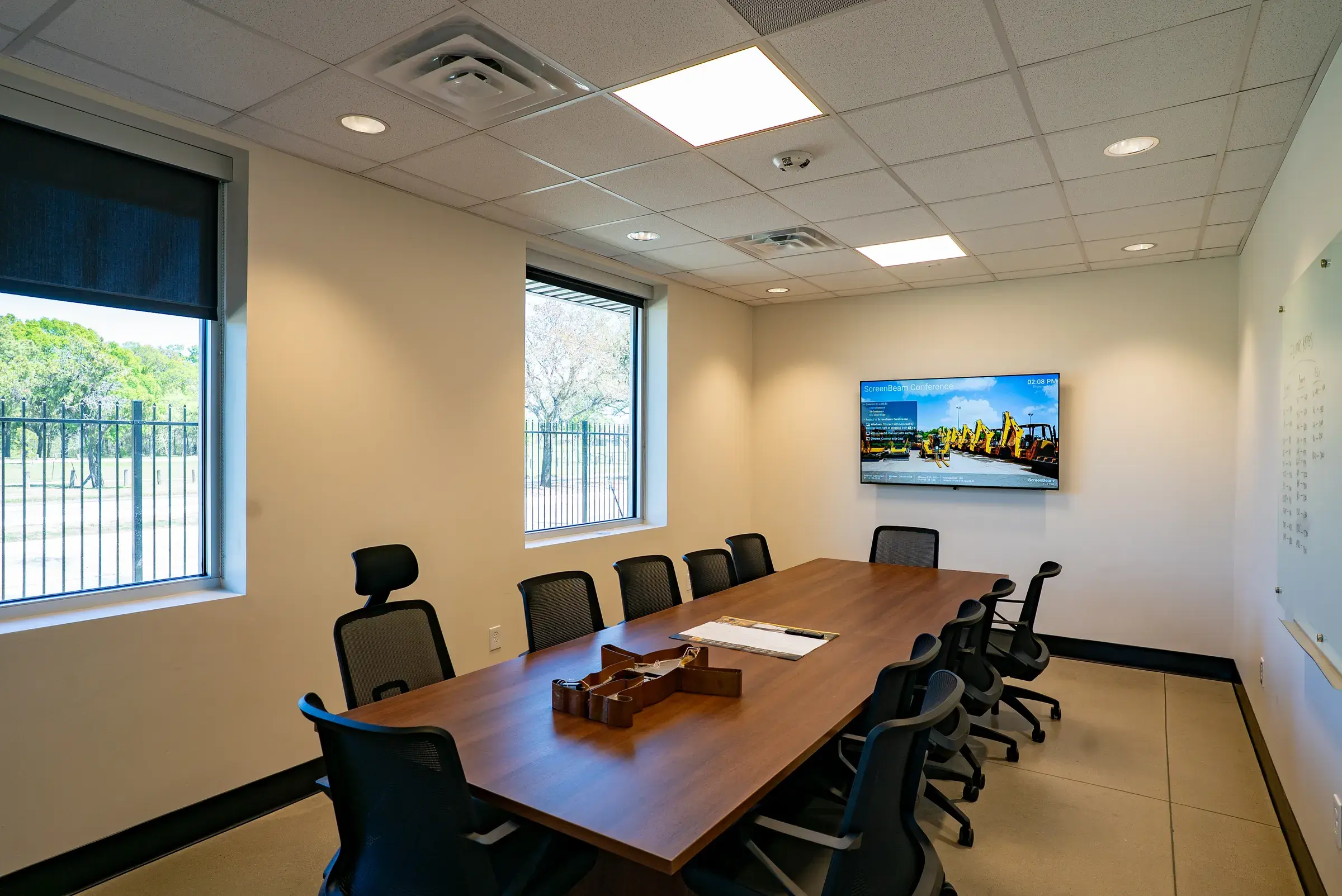 The conference room with display screen and window wall