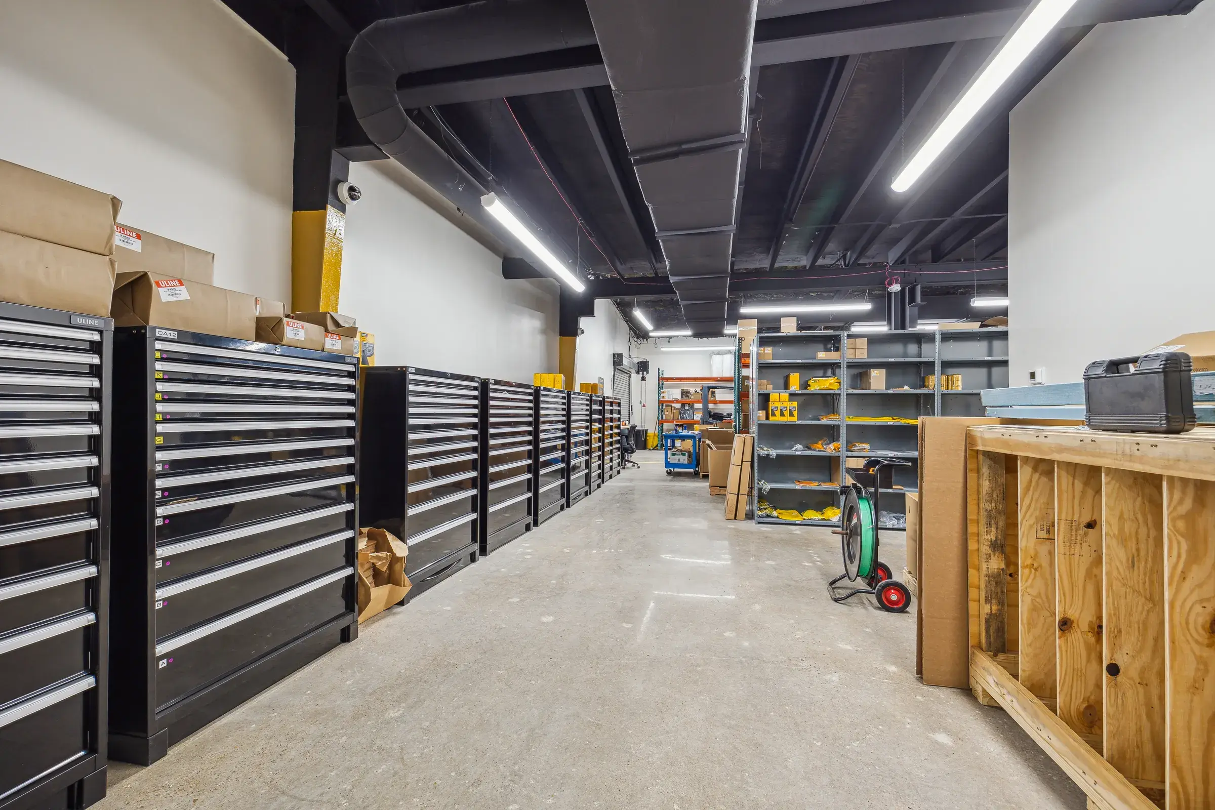 The tool room — a full wall of drawers running back to the counter