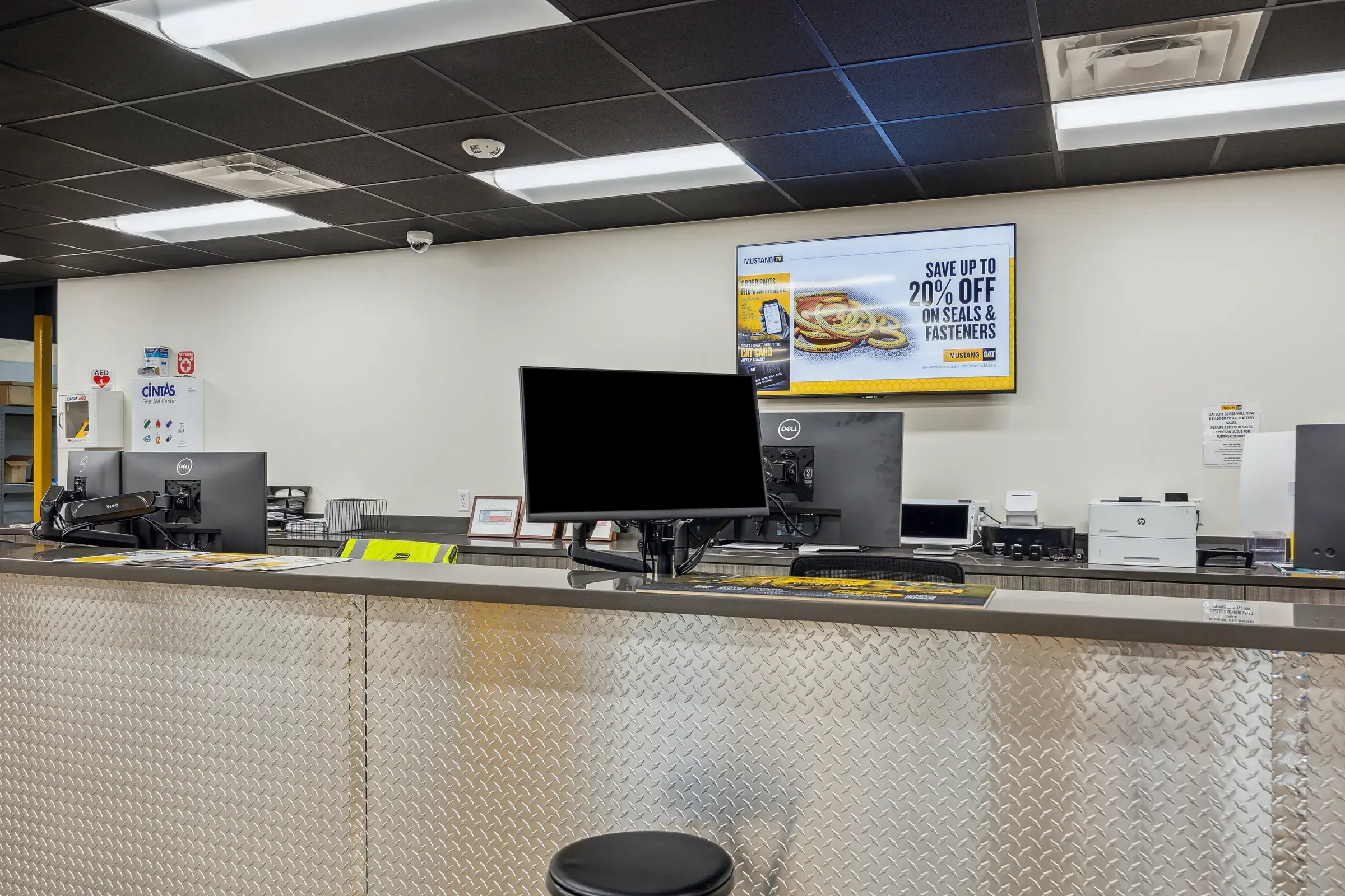 The parts counter with its diamond-plate front, facing the service floor