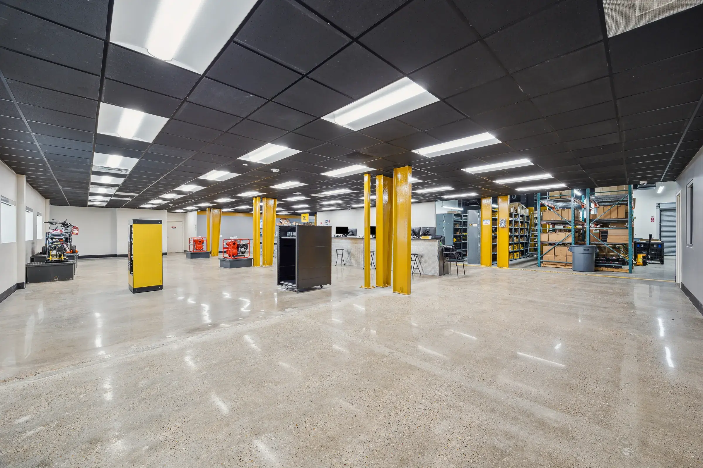 The showroom side with product shelving along the back wall